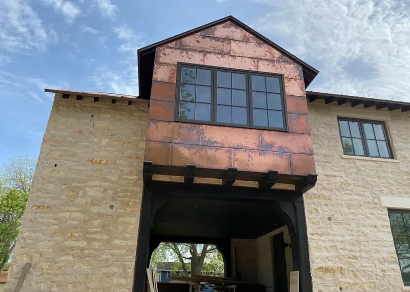 Copper metal panel facade on a stone building for Metal Roof Coating in Upper Macungie